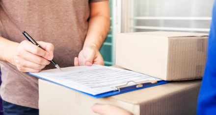 a man signing delivery receipt