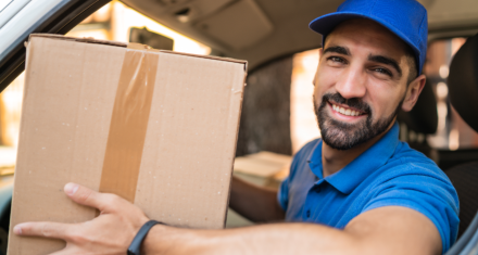 a delivery man smiling