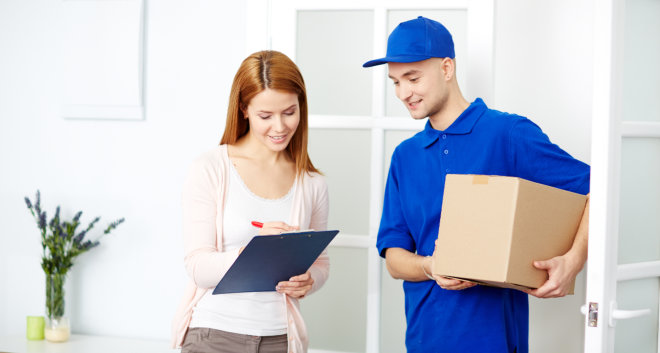 delivery man talking to a woman