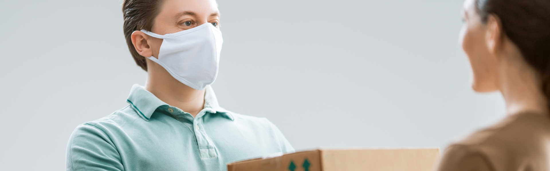 a delivery man handling a package