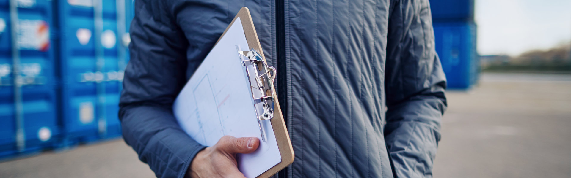 man holding a documents