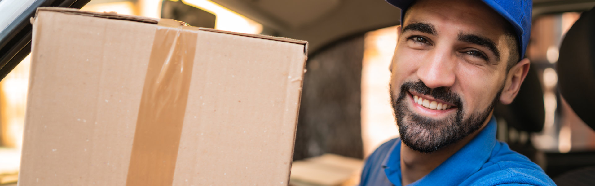 a delivery man smiling