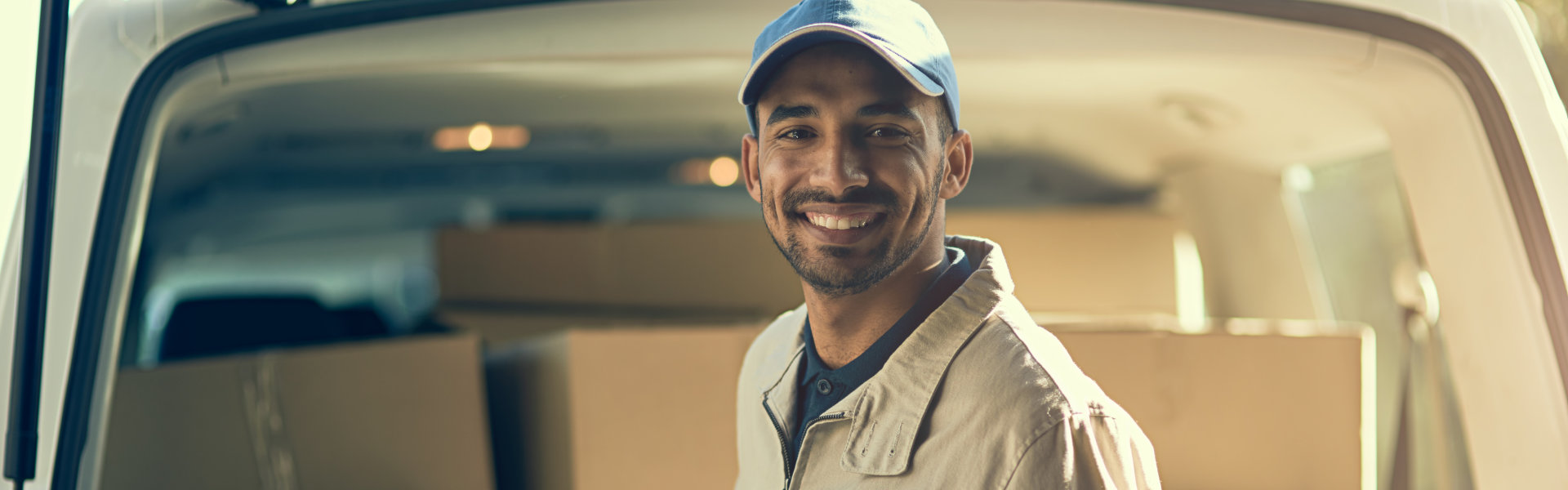 a delivery man smiling